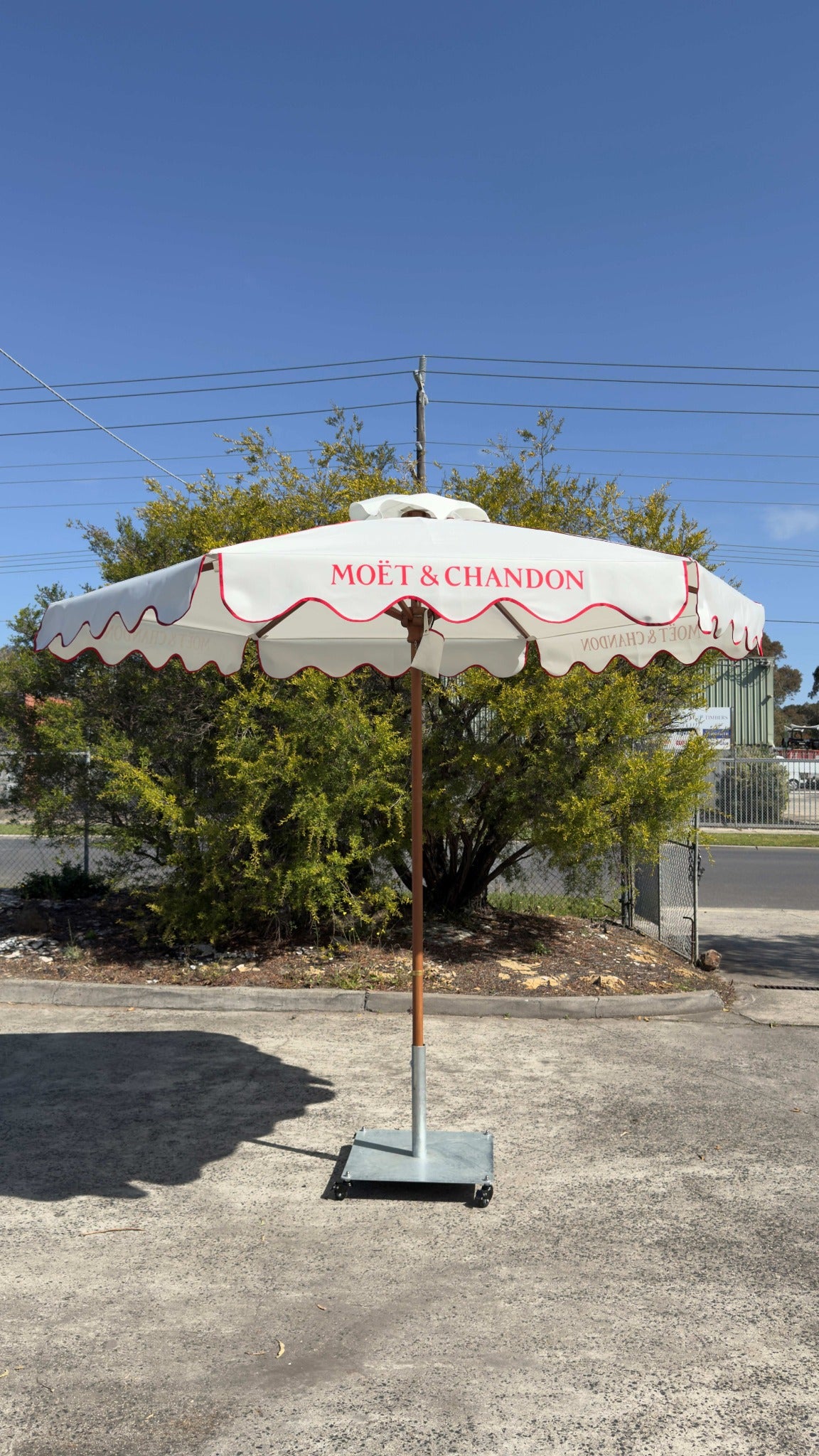 Moët & Chandon branded scalloped umbrella
